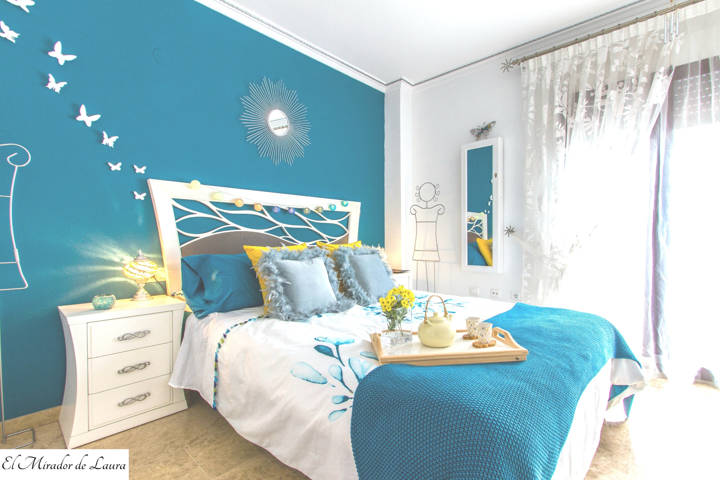 Dormitorio principal azul y blanco